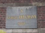 Plate with the name of a benefactor in the façade of the Dutch speaking Jesuits' school of Brussels